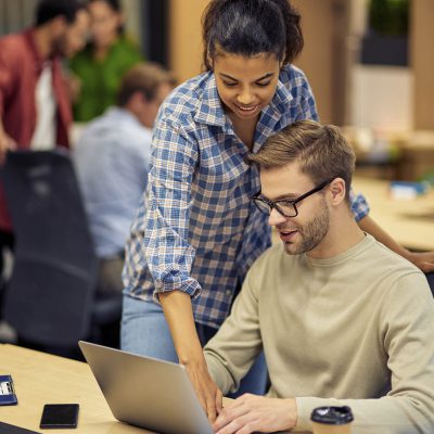mentoring-in-office-two-young-multiracial-colleag-2022-02-04-19-15-33-utc1.jpg